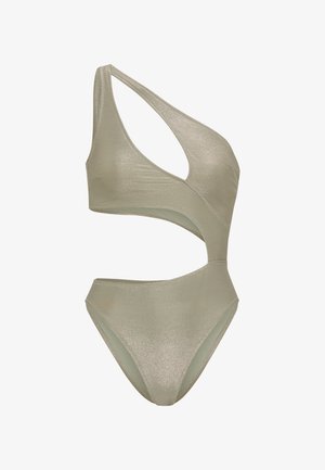 Skinnende metallic heldragt i lysegrøn. Har et designs med én skulder og udskæringsdetaljer samt en benhøj bund. Glat tekstur.