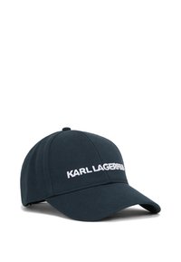 Marineblaues Baseballcap mit gebogenem Schild, ausgestattet mit gesticktem "KARL LAGERFELD"-Logo in Weiß, aus strukturiertem Stoff gefertigt und mit einer enganliegenden Passform.