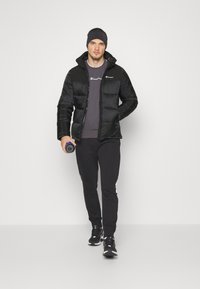 Champion HOODED JACKET - Spordijakk - black