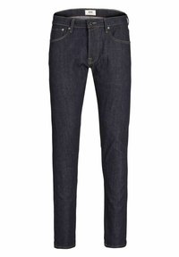 Jeans de mezclilla azul oscuro con corte ajustado, diseño de cinco bolsillos, costuras en contraste y cremallera. La tela tiene una textura suave.