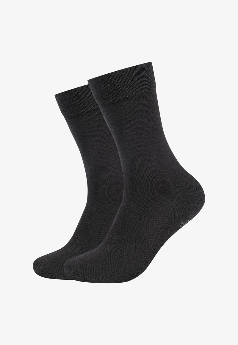 Para klasycznych czarnych skarpet za kostkę z prążkowanymi ściągaczami, pokazanych obok siebie na białym tle.