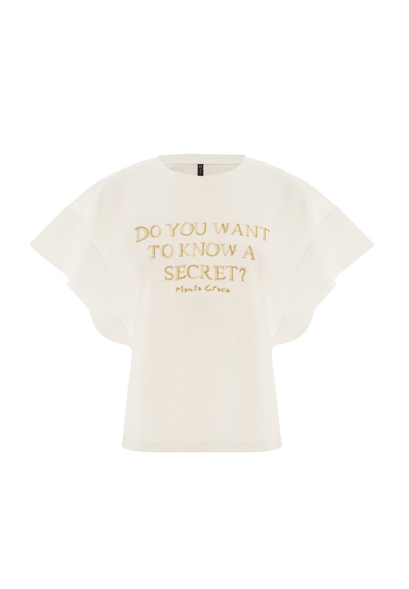 T-shirt blanc à manches courtes avec de larges manches et un texte doré qui dit "VEUX-TU CONNAÎTRE UN SECRET ? Manila Grace."