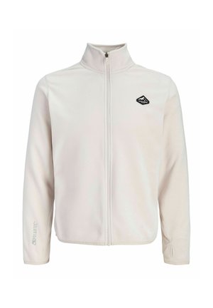 Veste polaire blanche zippée à col montant, petit logo noir sur la poitrine gauche et texte "Polartec" sur la manche gauche. Aucune personne visible.