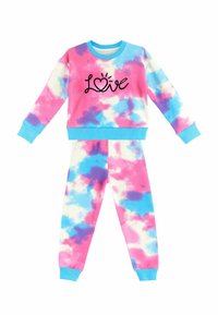 Różowy i niebieski zestaw piżam w stylu tie-dye wykonany z miękkiego materiału. Pulower z czarnym napisem "Love" posiada ściągacze na rękawach i w pasie.