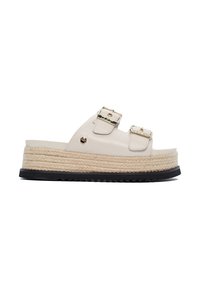 Sandalo slide in pelle crema con due cinturini regolabili in oro, suola intermedia in juta intrecciata e suola esterna in gomma nera.