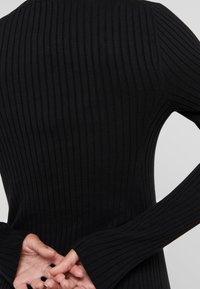 Repeat Abito in maglia - black