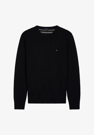 Pull en tricot noir avec un col rond. Présente des poignets et un ourlet côtelés, ainsi qu'un petit logo sur la poitrine. Texture lisse, silhouette ajustée.