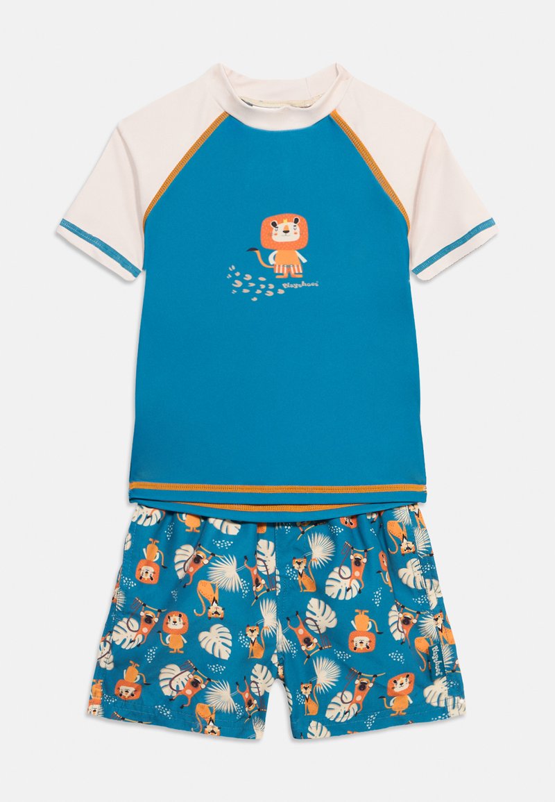 Μπλε και λευκό σετ μαγιό με κοντά μανίκια, με καρτούν λιοντάρι στο πάνω μέρος και κοντά μπλε σορτς με μοτίβο λιονταριών, φύλλων και παιχνιδιάρικων σχεδίων.