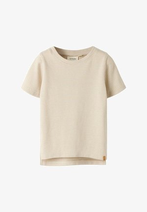 T-shirt beige pour tout-petit à manches courtes en tricot gaufré, avec col rond et petite étiquette brune au bas de l'ourlet.