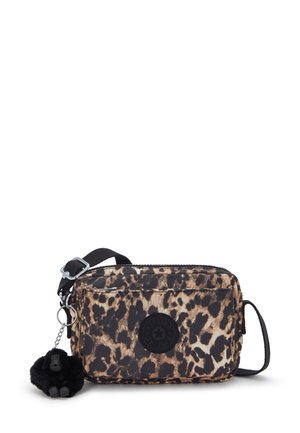 Leopard print crossbody bag featuring a black circular logo, zipper closure, and a furry monkey keychain attached to the side.