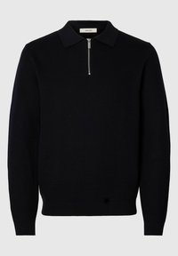 Schwarzer Strickpullover mit einem Reißverschluss am Kragen, gerippten Bündchen und Saum. Er verfügt über ein strukturiertes Muster und ein locker geschnittenes Design.