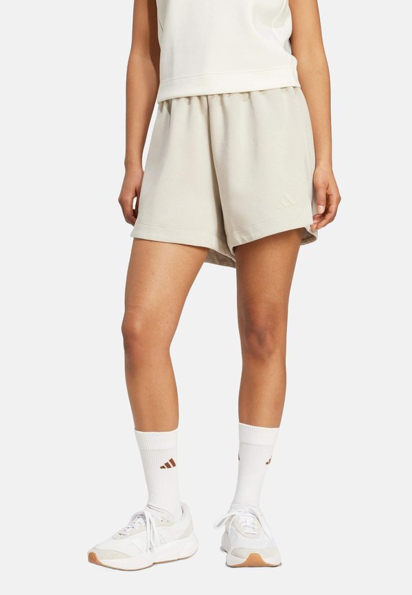 SOFT LUX LOOSE - Tracksuit bottoms - beige