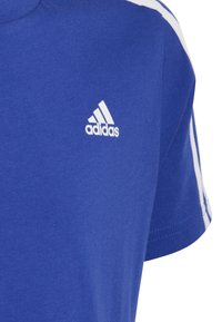adidas Performance TEE - Camiseta estampada - semi lucid blue/white