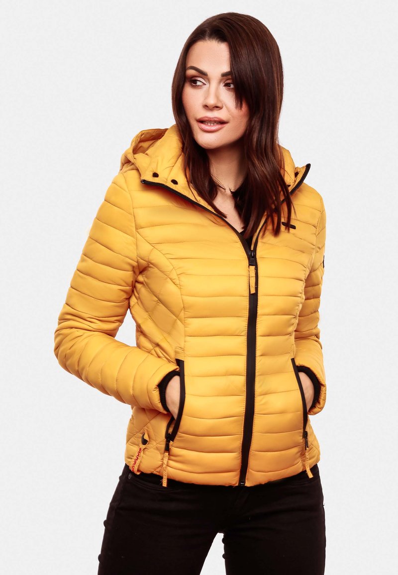 Yellow puffer jacket with a hood, featuring horizontal quilted texture, front zip closure, and black accents on zippers and pockets.