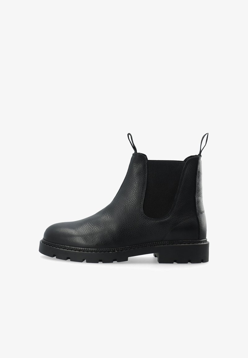 Schwarzer Chelsea-Stiefel aus Leder mit elastischen Seitenteilen, Zuglaschen am Knöchel, strukturierter Oberseite und robuster Gummisohle.