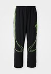 TEAMGEIST  - Tracksuit bottoms - black/signal green