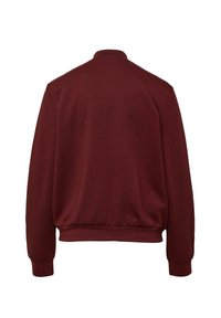 Bordeaux sweatshirt met een ronde hals, ribgebreide manchetten en tailleband, gemaakt van zachte stof. Heeft een gladde textuur en een eenvoudig ontwerp.