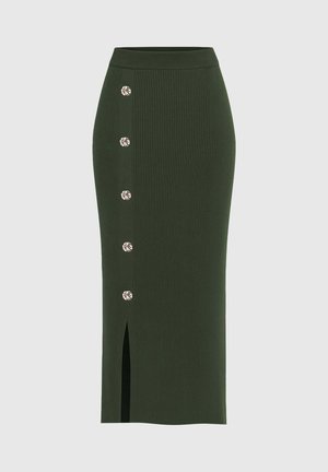 Jupe en maille côtelée verte avec une taille ajustée, ornée de boutons décoratifs sur un côté et d'une fente sur le côté pour ajouter du style.