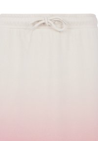 Beżowo-jasnoróżowe spodnie dresowe z gradientem, z elastycznym pasem i wiązanym z przodu sznurkiem.