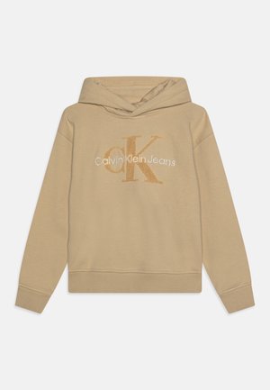 Felpa con cappuccio beige con un design del logo frontale che presenta "Calvin Klein Jeans" in bianco e un "CK" dorato testurizzato. Tessuto morbido, polsini a coste.