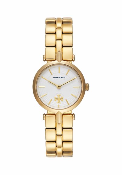 Guldtonet Tory Burch armbåndsur med link-armbånd, hvid urskive, gyldne time markører og logo kl. 6.