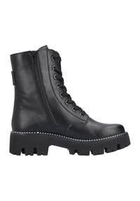 Botte chelsea en cuir noir avec lacets à l'avant, fermeture éclair sur le côté, semelle épaisse noire et accents de couture blanche. Texture lisse et design moderne.