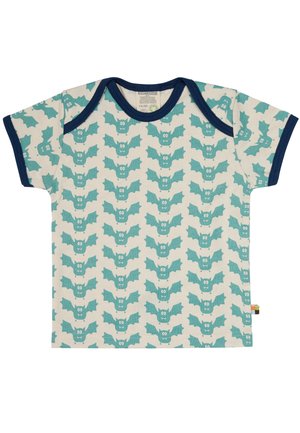 Korte mouwen shirt van lichtgewicht katoen, met een beige achtergrond en teal vleermuispatronen en marineblauwe afwerking langs de hals en mouwen.