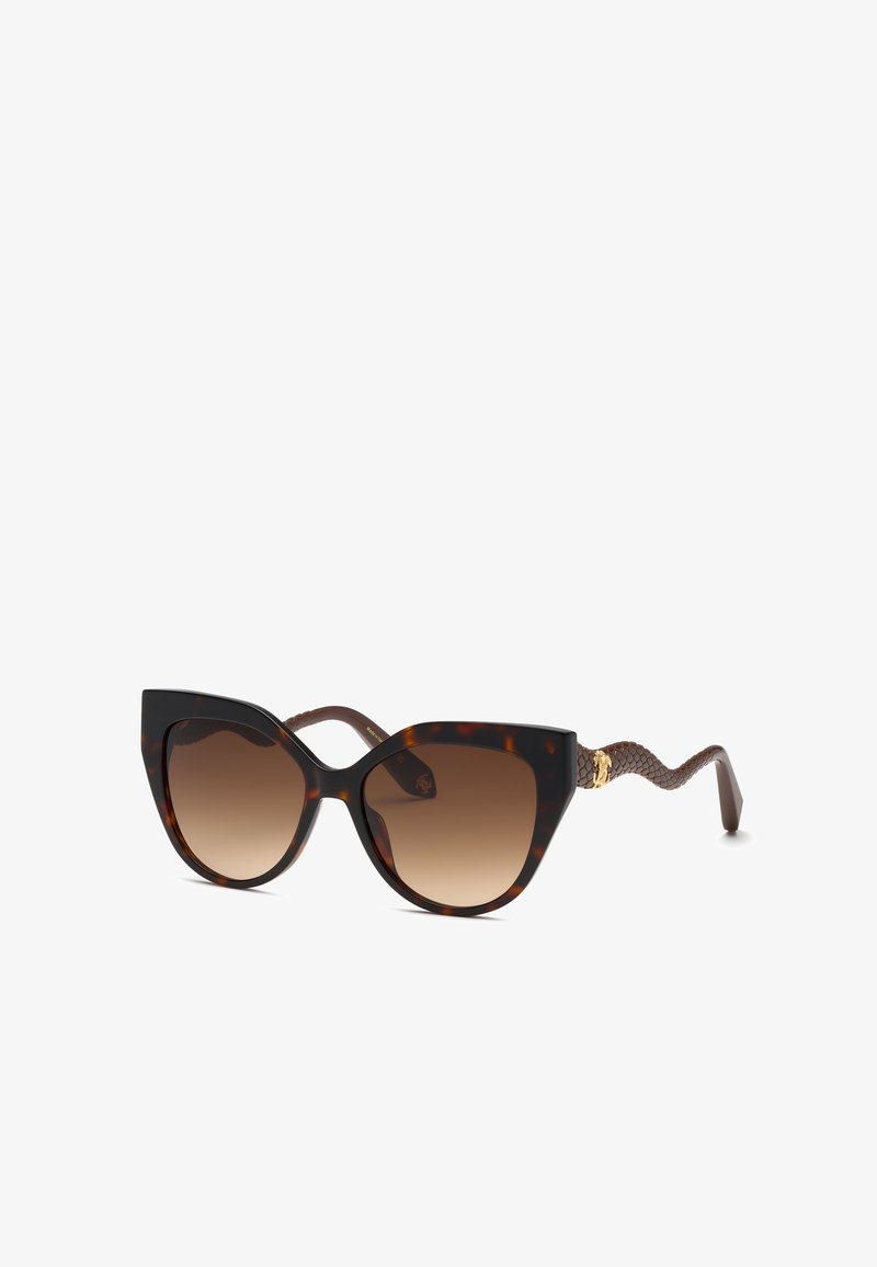 Lunettes de soleil œil de chat en écaille avec verres dégradés marron et branches marron texturées à motif serpent avec détails dorés.
