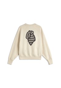 Sweat-shirt couleur crème à manches longues, avec un grand motif coquillage noir brodé dans le dos.