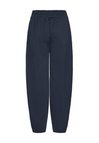 Pantalon bleu marine à jambe large, taille élastique et texture lisse. Pas de motifs visibles ni de détails matériels.