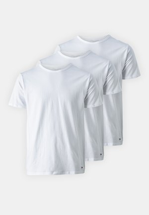Three white cotton t-shirts with short sleeves, round necklines, and a small logo on the lower left side. Smooth texture, standard fit.
