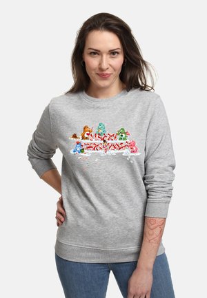 Grå sweatshirt med farverige tegneserie-aber og slikstænger foran. Rund halsudskæring og ribbede manchetter. Blandet stoftekstur.