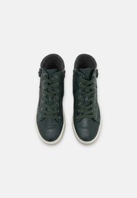 Green leather high-top sneakers with decorative stitching, contrasting white rubber soles, and a side zip for easy access. Soft inner lining.