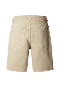 Beige denim shorts with two back pockets, belt loops, and a small brown brand label on the waistband.