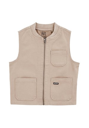 Beige ærmeløs vest lavet af holdbart materiale, med en frontlynlås og to store forlommer. Inkluderer et logomærke på den højre lomme.
