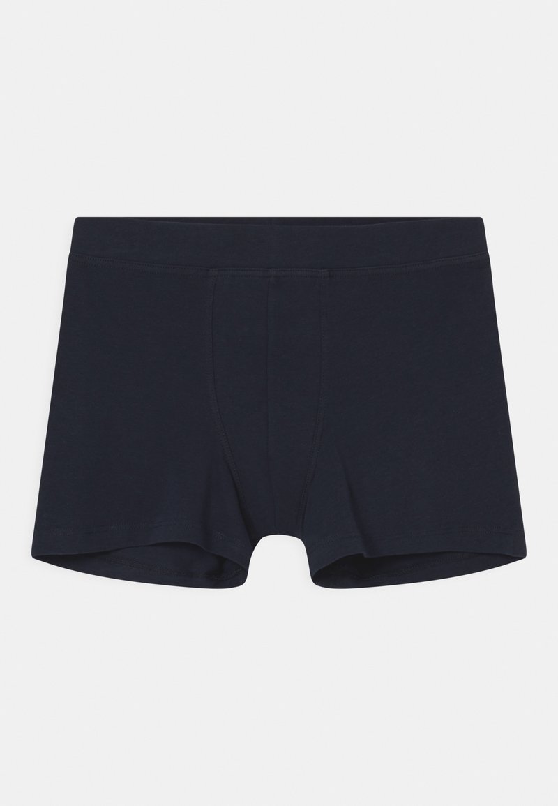 Boxers de algodão azul-marinho com cintura elástica, apresentando um design em painel e detalhes de costura. Textura suave, comprimento até a metade da coxa.