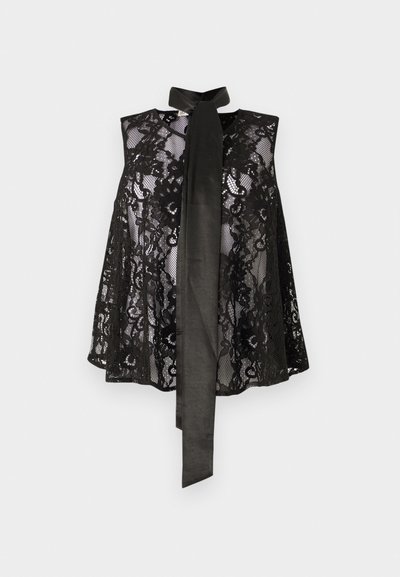 Schwarzes Spitzenoberteil mit ärmellosem Design und einer Halsbinde. Die Spitze hat florale Muster und eine durchsichtige Textur, was einen eleganten Look kreiert.
