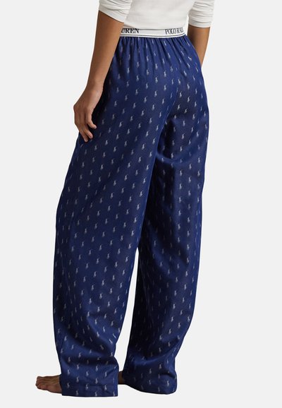 Marinblå pyjamasbyxor i bomull med resårmidja, prydda med ett återkommande mönster av ljusgrå polo-spelare och en avslappnad passform.