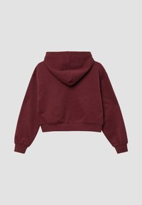 Krótka bluza z kapturem w kolorze bordo, z regulowanym sznurkiem, prążkowanymi ściągaczami przy rękawach i u dołu. Miękka, teksturowana tkanina i luźny krój.