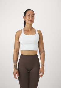Reebok LUX  - Športová podprsenka so strednou podporou - chalk