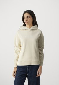 Calvin Klein HERO LOGO HOODIE - Sportinis megztinis - wood ash