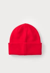 Red knitted beanie hat with a folded cuff, smooth texture and rounded top, designed for warmth and comfort.