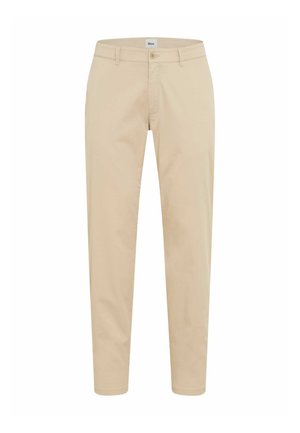 Pantaloni beige aderenti con passanti per cintura, chiusura frontale con bottone e zip, realizzati in un tessuto liscio, esposti su sfondo bianco.
