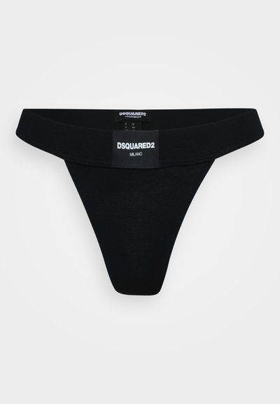 Black thong underwear with a soft, wide waistband. Features a tag displaying "DSQUARED2 MILANO" on the front. Smooth texture, minimal design.
