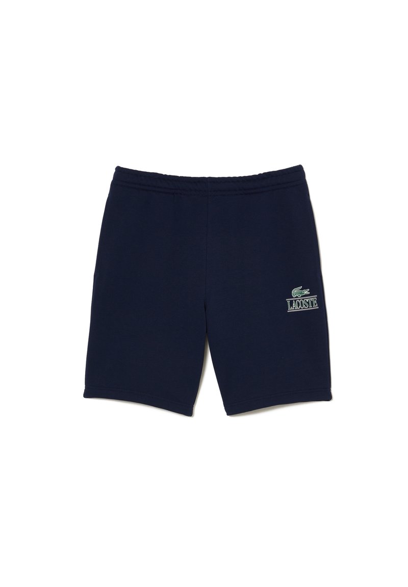 Shorts bleu marine en tissu mélangé coton, avec une taille élastique, un écusson logo sur la jambe gauche et une coupe droite.