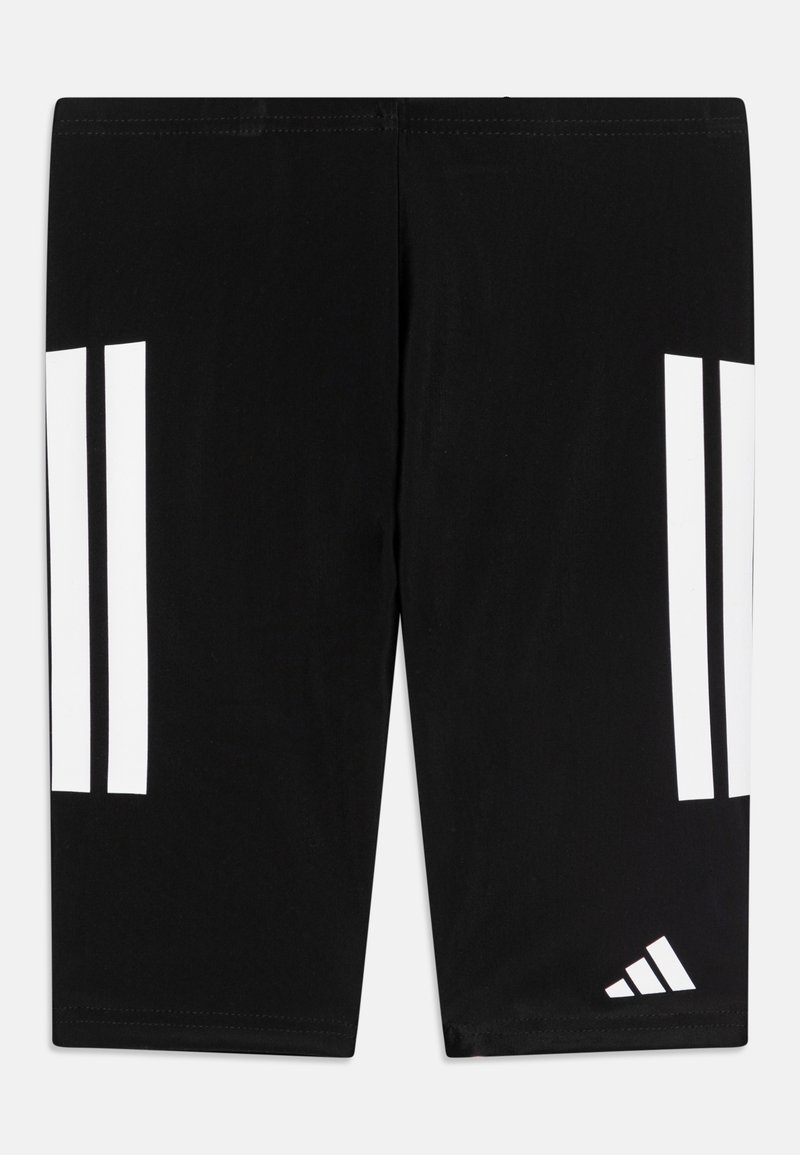 Black athletic pants with white three-stripe design on sides and a small white adidas logo at the bottom. Made from stretchy fabric.