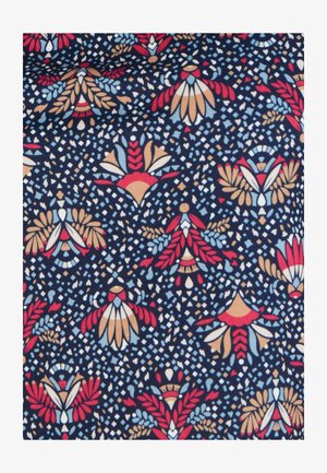 Tissu bleu marine présentant un motif floral en rouge, bleu et beige, avec des formes abstraites et de petits accents de points blancs partout.