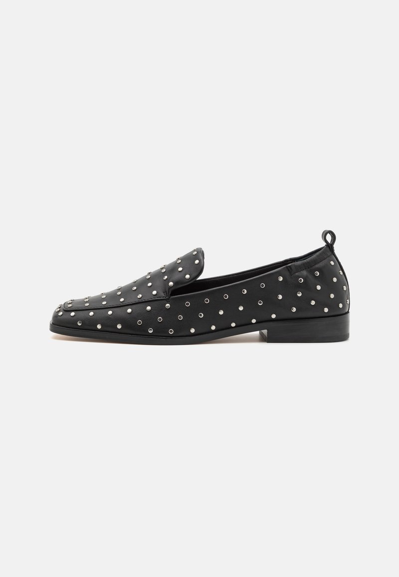 Black leather loafers with a rounded toe, adorned with silver studs. Features a low heel and a pull tab at the back for easy wear.