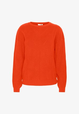 Lys orange sweater med ribbet tekstur, rund halsudskæring og sænkede skuldrer, med et geometrisk mønster syet ind i stoffet.