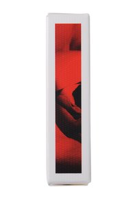 Tall rectangular packaging with a textured white surface featuring a red and black graphic design of a hand. Simple, modern aesthetic.